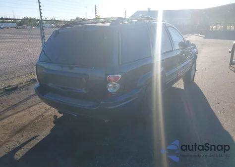 1999 Jeep Grand Cherokee Limited из США, поврежденный, VIN 1J4GW68S0XC676490